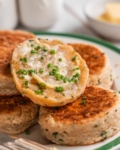close up of savoury cheesy herby welsh cakes with butter and chives